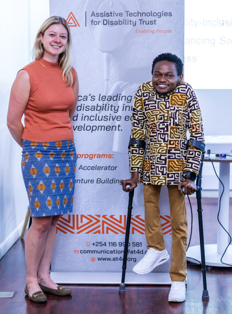 Abi Taylor, Program Director for Innovationat the Judith Neilson Foundation, is photographed with Bernard Chiira during the International Day for Disabilities, 2025.